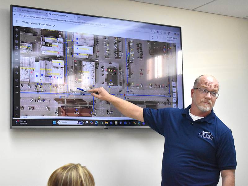 Creston Waterworks General Manager Steve Guthrie points at a map of Adams Street which will see construction starting by the end of March.