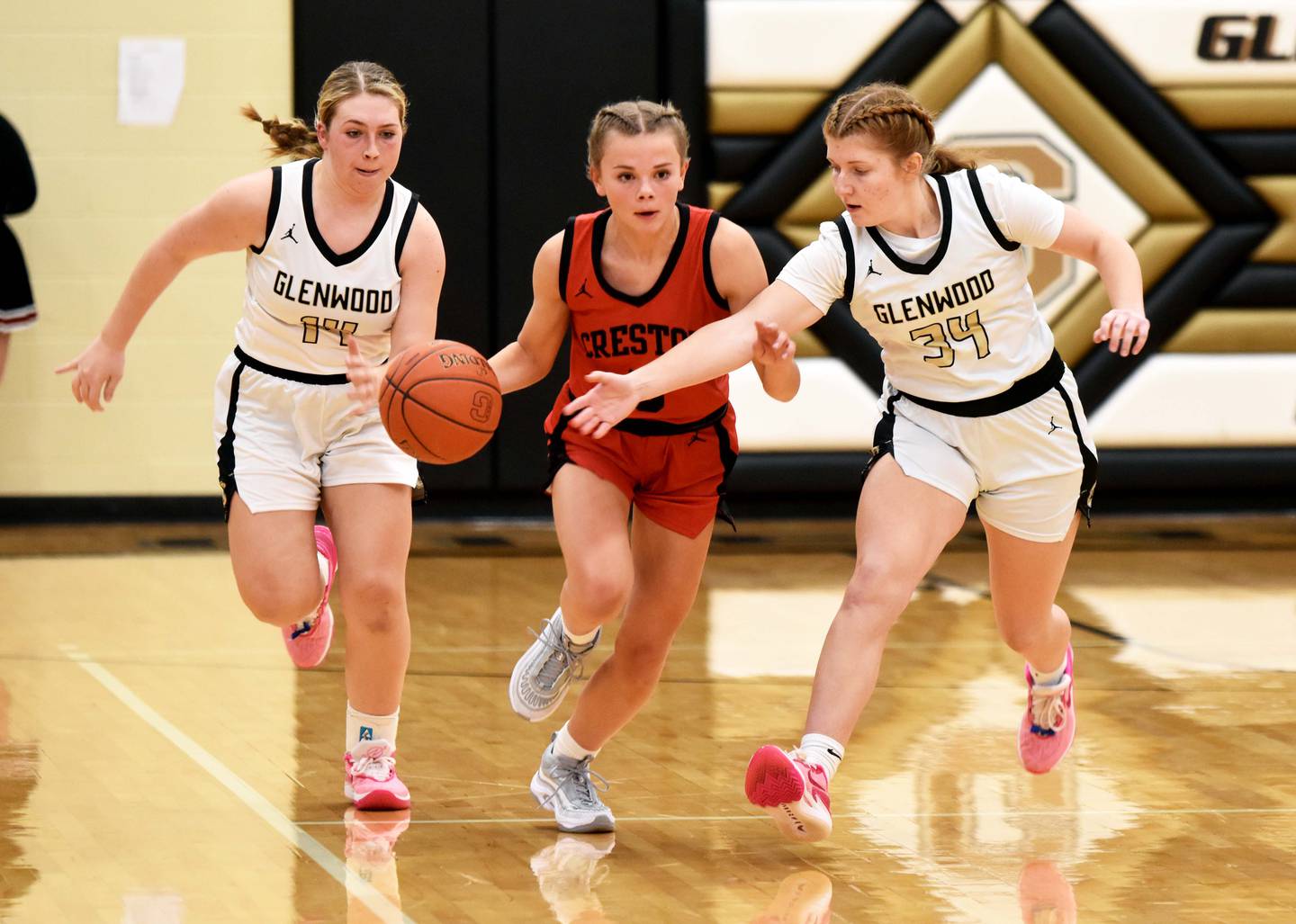 Ava Adamson dodges defenders as she takes the ball down the court. Adamson had two steals against Glenwood.