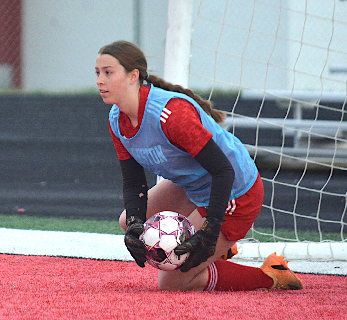 Creston/NV goalkeeper Lea Stonebraker lunges for one of her 32 saves against Denison-Schleswig, a Nodaway Valley school record.