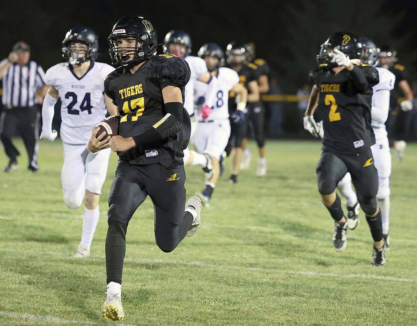 Gabe Funk scores one of his 63 rushing touchdowns as the Lenox quarterback for four years. Funk also passed for 3,759 yards and 63 touchdowns.