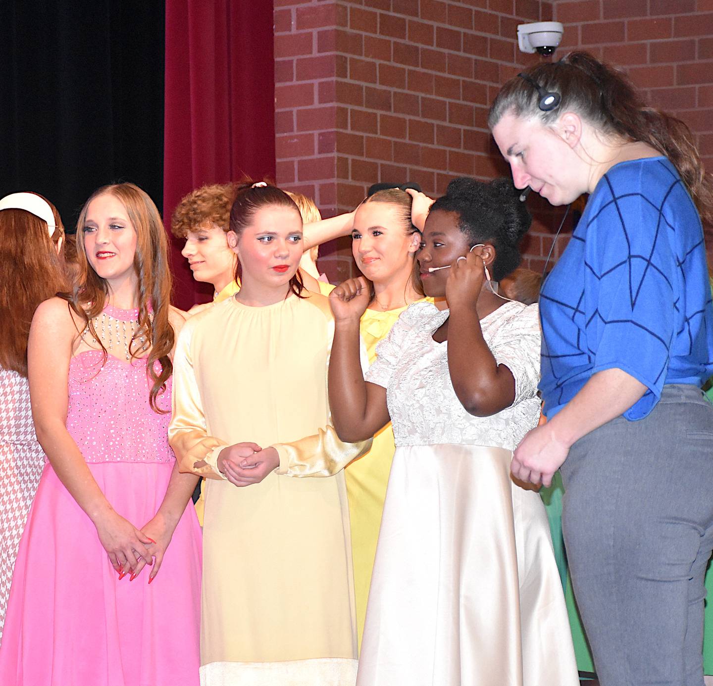 Director of "Catch Me If You Can The Musical" Jennifer Gaesser, right, gives instructions during a rehearsal. Students front row, left to right: Emma Bolton, Chelsey Brumfield, Haileigh Lundy, Janea Green-Ngang.