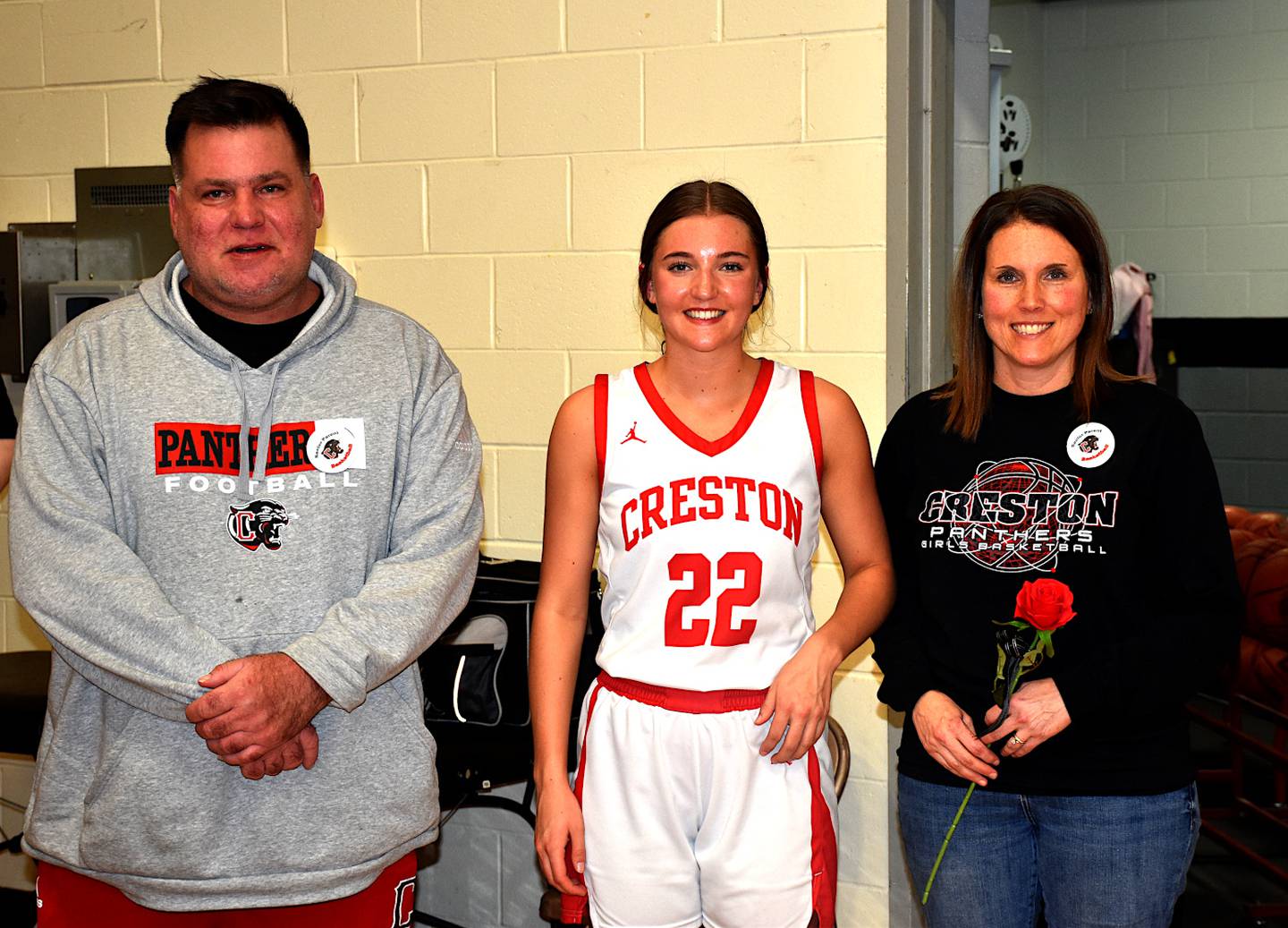 Creston senior Adyson Morrison with parents Brian and Tina Friday during senior girls basketball night.