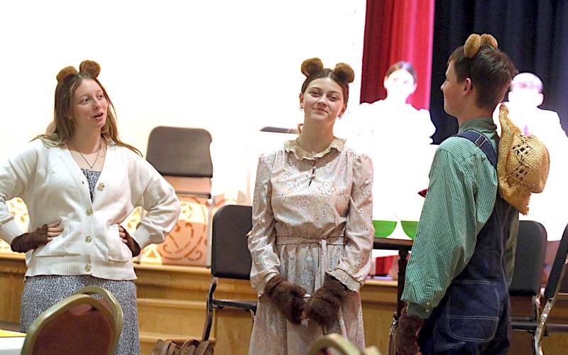 From left, Edan Shilling, Bella Day and Micah Cronk rehearse for the Nodaway Valley spring play "Goldilocks on Trial," which is 7 p.m. Friday and Saturday at the Warren Cultural Center.