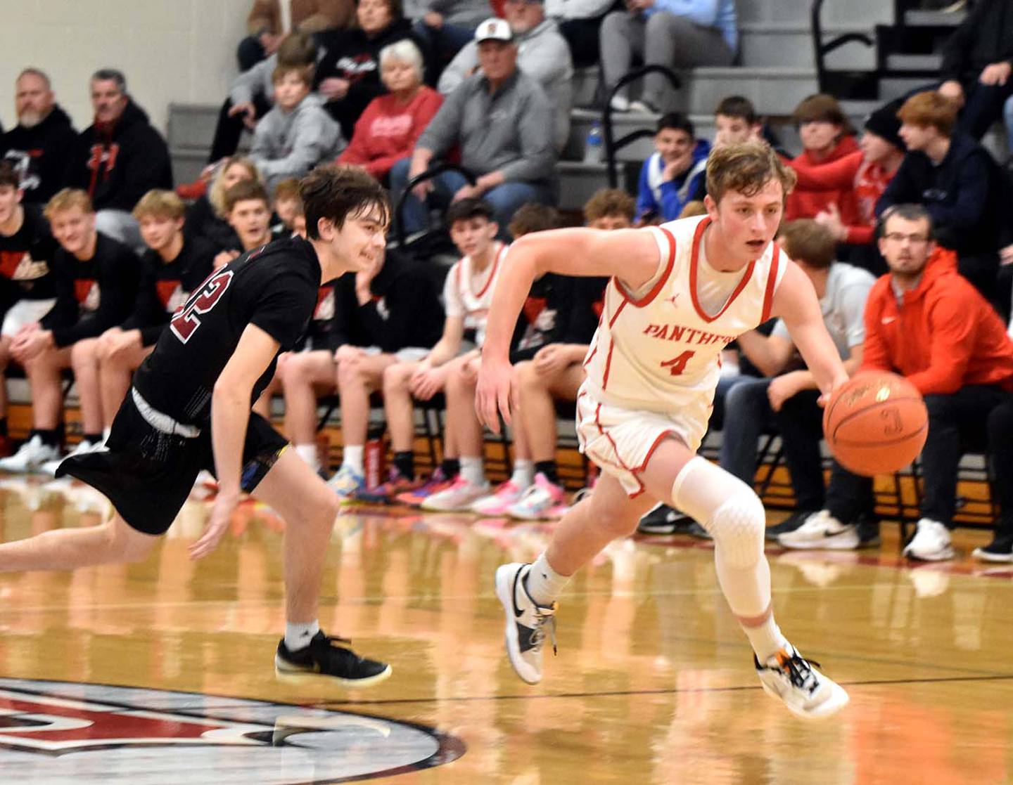 Cael Turner (4) holds Creston basketball school records for steals in a season (68) and career (168) in addition to scoring 14 points a game as a senior.