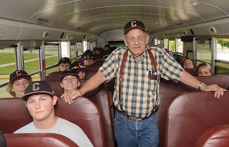 Darwin West with Creston baseball and softball players on one of his final activity trips before retiring during the summer of 2018.