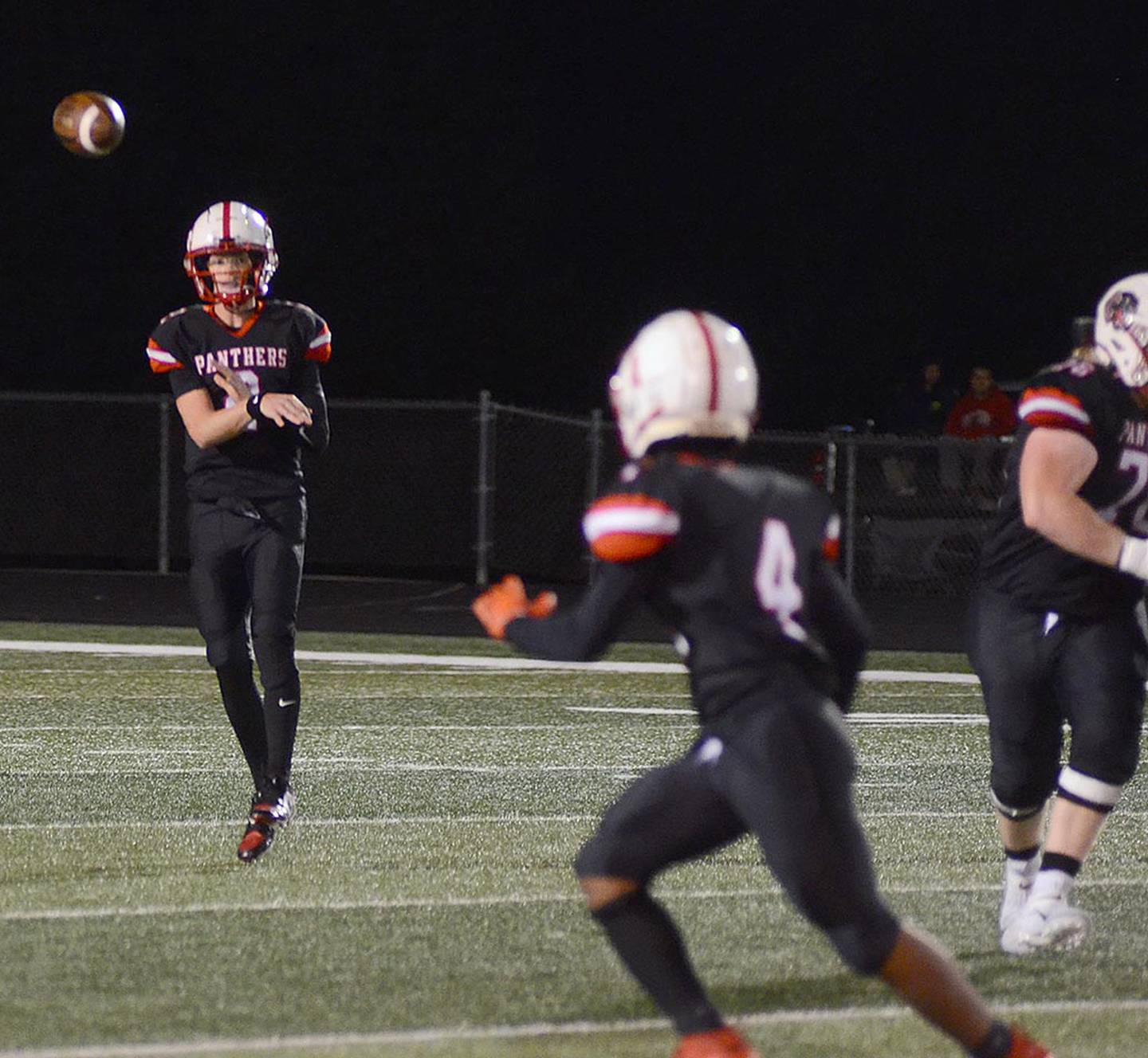 Creston quarterback Tanner Ray throws to receiver Durrell Haynes (4). Ray completed 14 of 25 passes for 156 yards and ran for 42 yards.