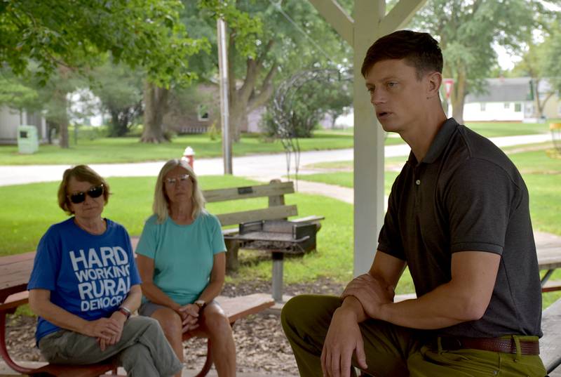 State of Iowa Auditor Rob Sand, right, meets with Creston area people Tuesday at Rainbow Park in Creston. He visited multiple towns that day.