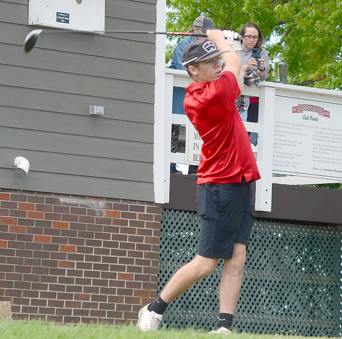 Kylen Parsons follows through on his tee shot on No. 1 at Crestmoor Golf Club Wednesday. Parsons led the Panthers with an 18-hole round of 86 on the par-72 course.