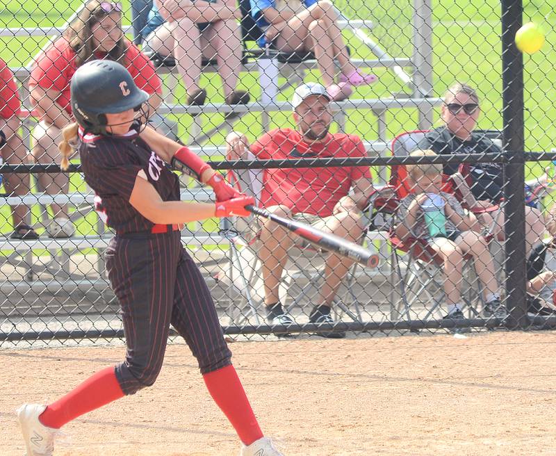 Creston right fielder Sasha Wurster connects on a solo home run to left field in Creston's 10-5 win Friday over Denison-Schleswig. It was Wurster's second home run of the season.