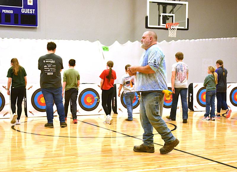 Nodaway Valley archery coach Bill Newbury supervises practice Thursday, Feb. 6 at Nodaway Valley Elementary School, which doubled as a fundraising shoot for St. Jude's Children's Research Hospital.