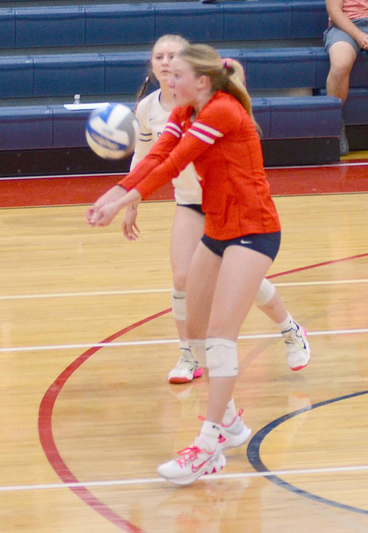 Emily Strait of Southwestern receives a serve as teammate Lexi Hahn (1) looks on. Straight led the team with 12 digs and Hahn had eight.
