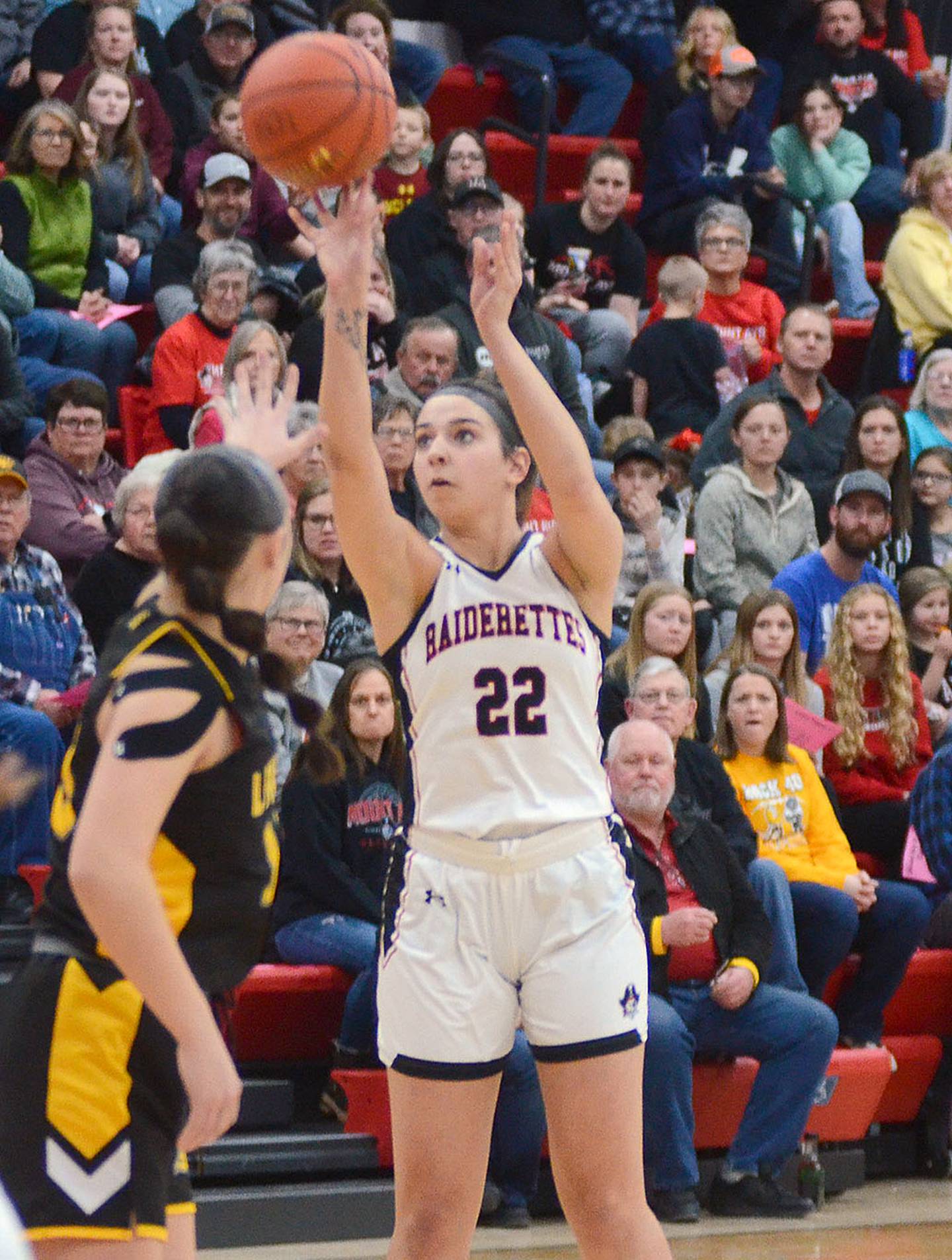 Mount Ayr senior Breya Nickle shoots against Lenox Friday. NIckle scored four points in the Raiderettes' 36-32 loss.