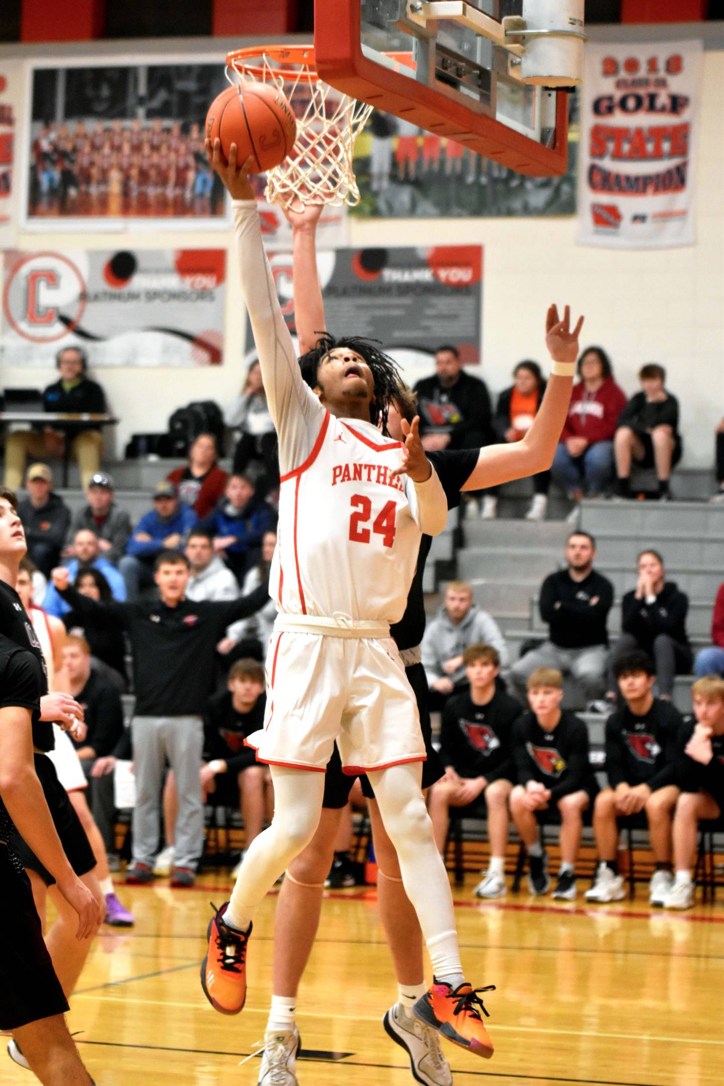 Tony Davidson takes a layup early in the game. Davidson contributed 12 points.