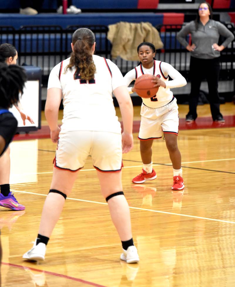 Freshman guard Jordyn Hall passes the ball to teammate Roslynn Huston last Tuesday against Iowa Western in a 70-48 home loss.