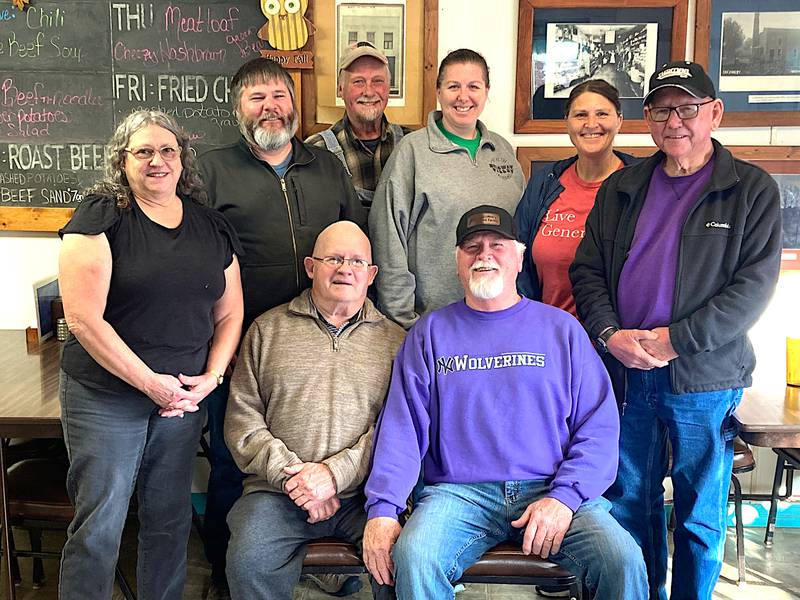 From left in back are, Elaine Hochstatter, Derrick Shaull (driver and transportation director), Roger Frese, Christine Rubio, Brenda Croghan and Ben Lyons. Seated is retired long-time transportation directorJim Paullin and Dean Griffith. Griffith retired last week after a long career as a Nodaway Valley bus driver.
