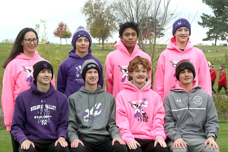 At the state cross country meet are from left in front, Paul Kading, Luke Kading, Haden Colton, Gabe Winkelmann; back: Head Coach Brooke Wilson, Josh Nelson, Cherubim Mercado and Everett Ehler.