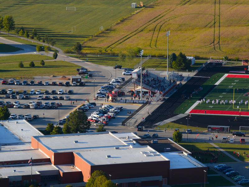 High school tennis courts planned to replace part of gravel parking lot