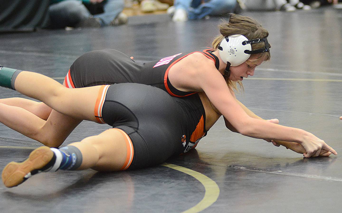 Creston's Ella Pryor pins Robin Cortez Yepez of Council Bluffs Thomas Jefferson during a 105-pound consolation match Friday.