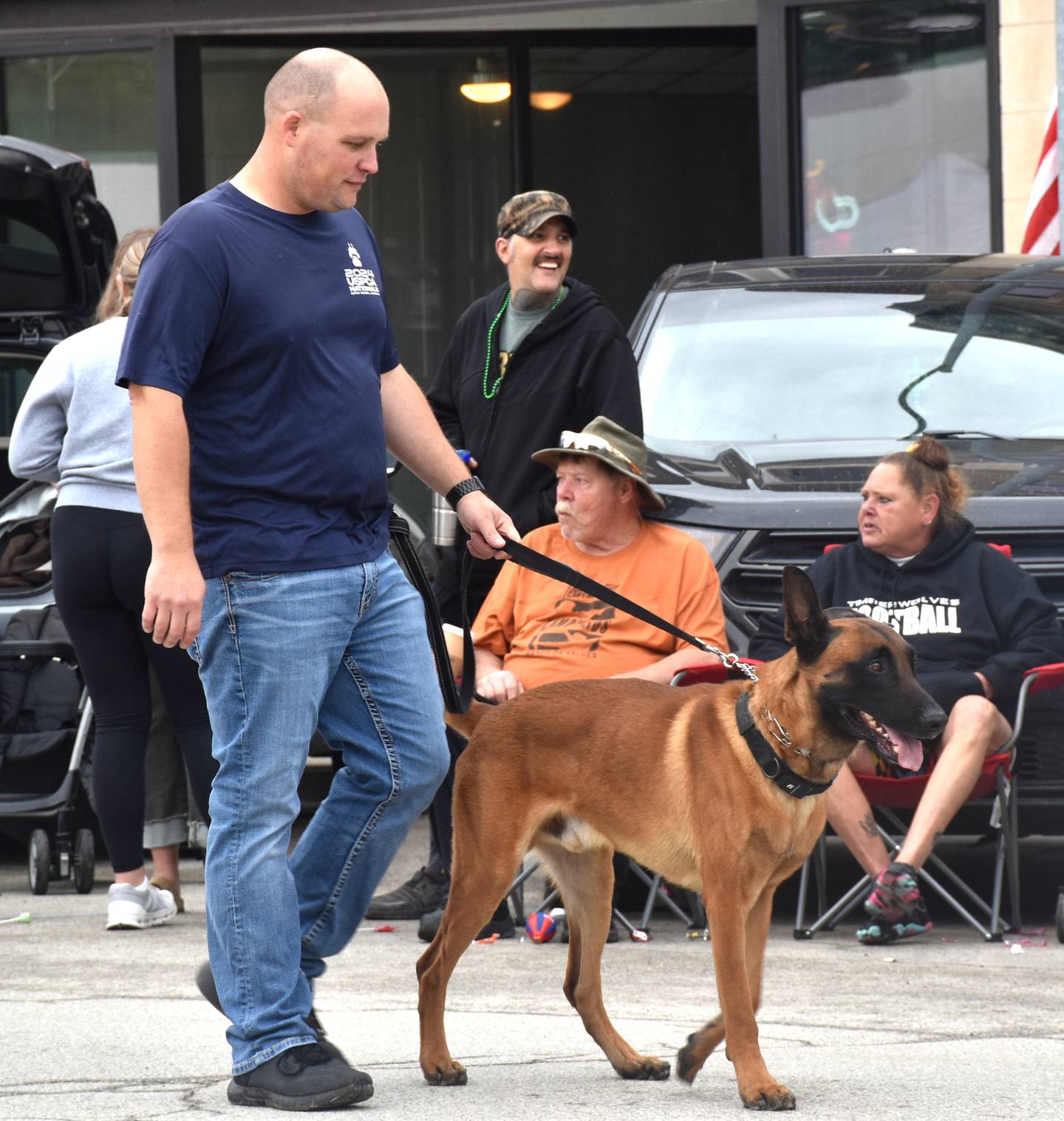 Hale with his K-9 Duke during the Southwest Iowa Hot Air Balloon Days parade Saturday, Sept. 20.