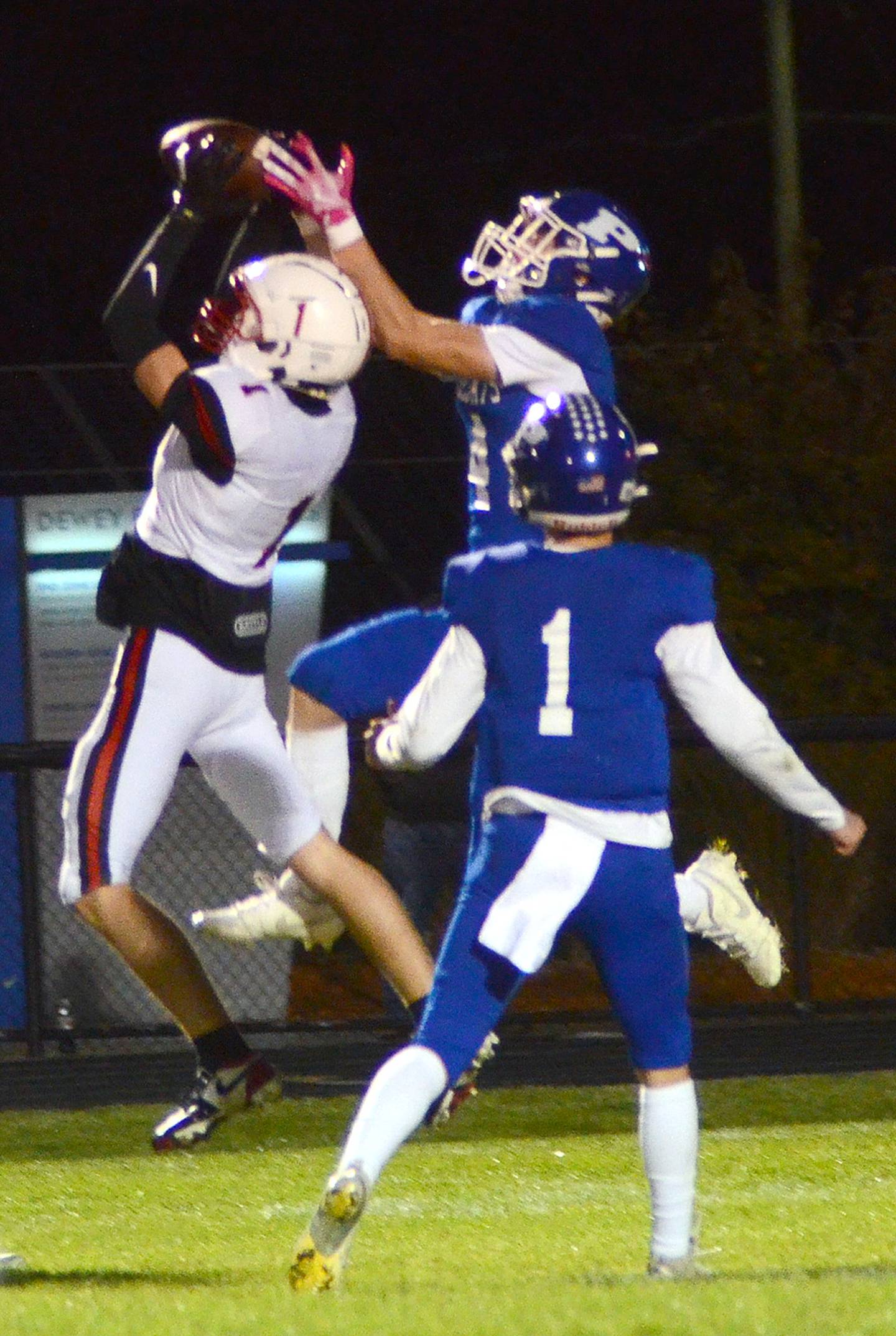 Creston's Jace Purdum makes a catch while heavily covered for a 48-yard gain that set up a touchdown for a 26-13 lead at Perry Friday. Purdum had six catches for 107 yards and one touchdown.
