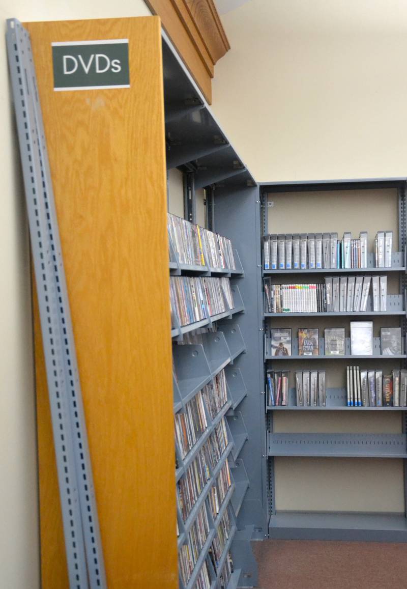 The library's DVD policy is in the process of being updated. DVDs can currently only be checked out for three days at a time, with only three DVDs to a household.