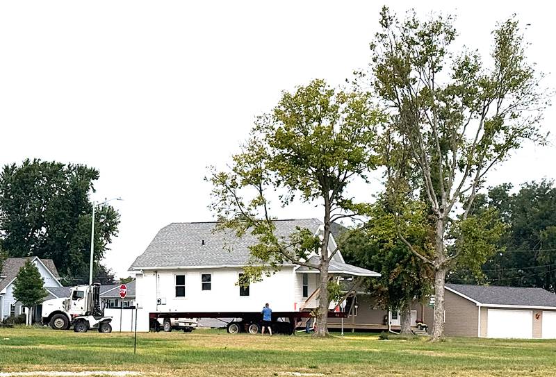 A house is moved in on a truck to a location on Southeast Kent Street in Greenfield in September 2024.