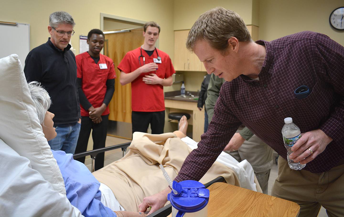 SWCC boardmember Zach Gunsolley feels the pulse of the mannequin. The board received a full demonstration of the capabilities of these simulations during Tuesday's regular meeting.