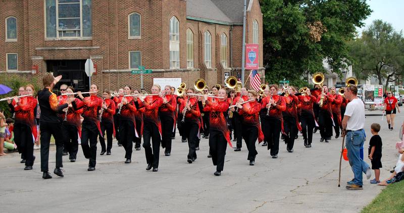 Creston High School's marching band performs during the Southwest Iowa Hot Air Balloon Days parade.