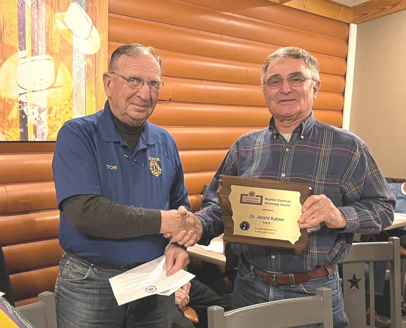 Katzer is awarded the Warren G. Coleman Award, the highest honor bestowed by the Iowa Lions Foundation, in 2022.