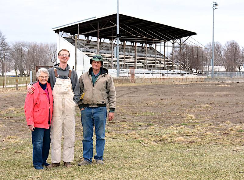 Shirley, Trevor and Jerry Meisenheimer in front of the late 1920s grandstand at the Adair County Fair. It will be razed after this year's fair and a new one built.