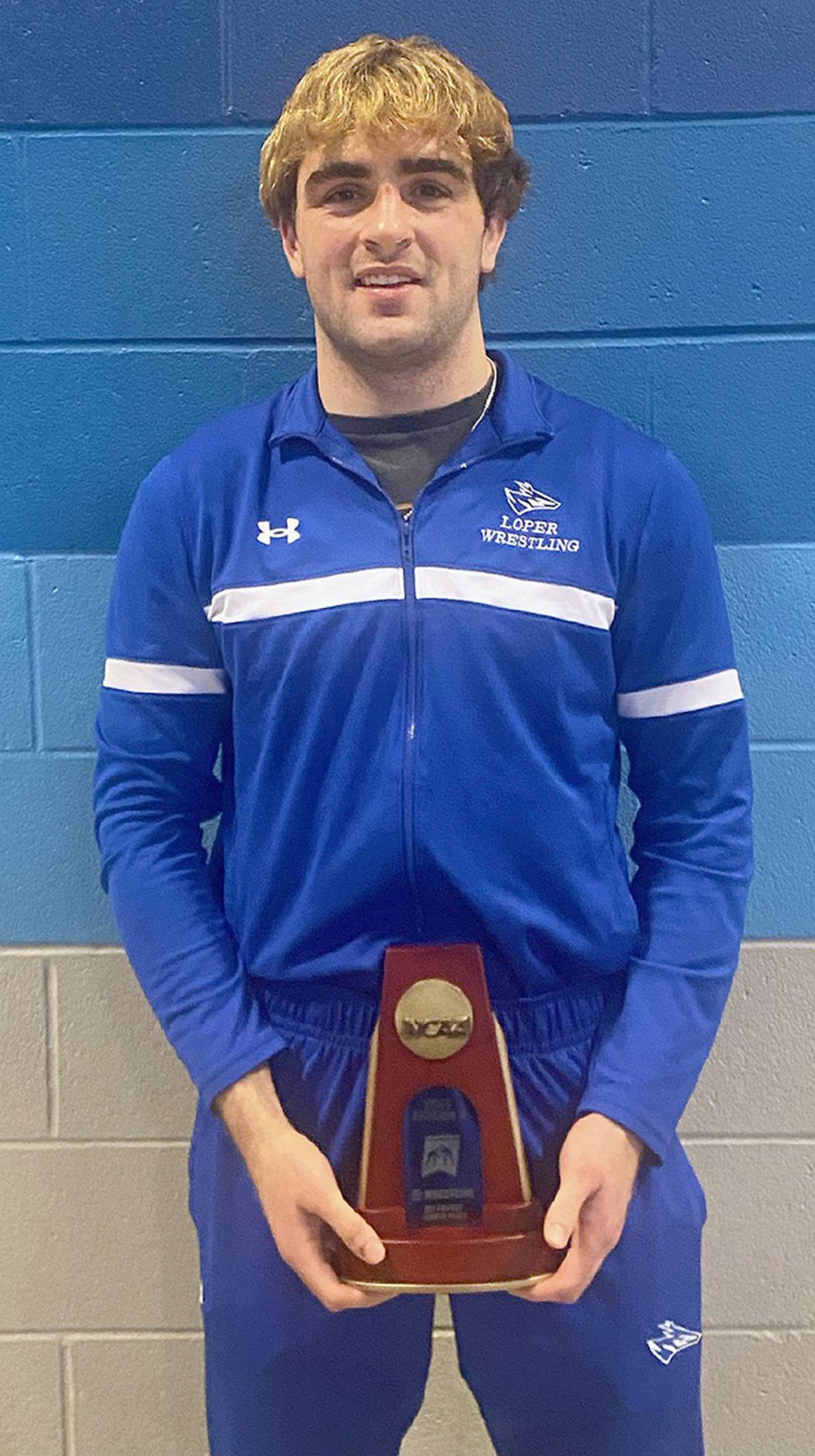 Jackson Kinsella is shown with his All-American plaque after placing fourth in the NCAA Division II wrestling championships. Kinsella is a 2021 graduate of Creston Community High School.