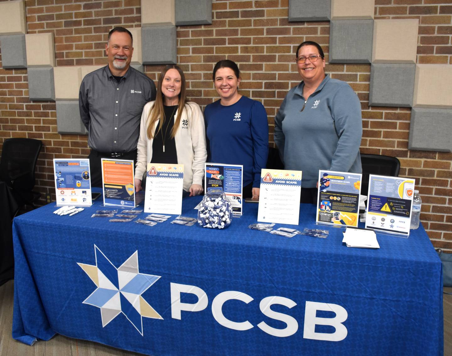 The crew of Creston's PCSB help share information about fraud prevention Tuesday night.