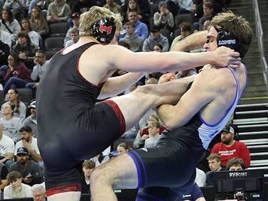 Kinsella helps UNK pin another title